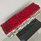 100 Red Roses in A long Colorful box