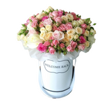Assorted Color flowers in a round box - Deluxe