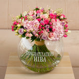 Assorted flowers in a large bowl vase - hydrangea and roses