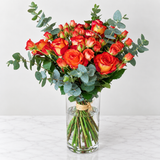 orange flowers in a Glass vase