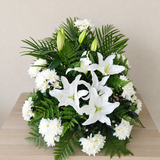 White flowers and lilies basket