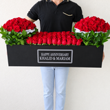 Red Roses in A long black box with 2 round boxes
