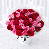 50 Red and Pink Roses with green ruscus