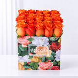 Orange Roses in a Colorful Box