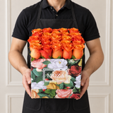 Orange Roses in a Colorful Box