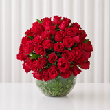 100 Red roses in a fish bowl vase - Dome shape