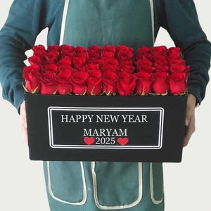 Red roses in black super deluxe box - Happy New Year