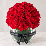 Red roses in a fish bowl vase - Dome shape