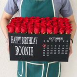 Red roses in black super deluxe box - Calendar