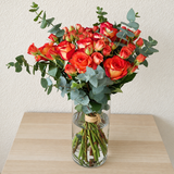 orange flowers in a Glass vase