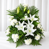 White flowers and lilies basket