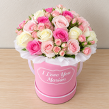 Assorted Flowers in a personalized Pink Round Box
