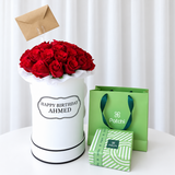 Red roses in a White Round box with chocolate