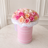 Pastel Roses in a Pink Round Box