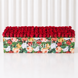 100 Red Roses in A long Colorful box
