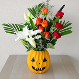 arrangement of red & orange roses in a vase - Halloween
