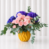 purple hydrangea and pink flowers in A yellow Vase