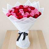 50 Red and Pink Roses with green ruscus