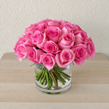 Pink Roses in a Glass Cylinder Vase