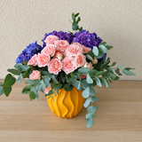 purple hydrangea and pink flowers in A yellow Vase