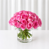 Pink Roses in a Glass Cylinder Vase