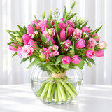 tulips arragemnt in a fish bowl vase
