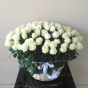 101 white Roses In a basket