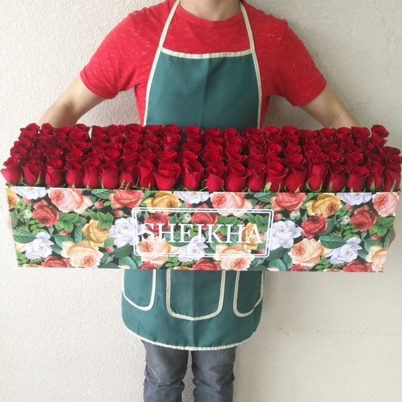 100 Red Roses in A long Colorful box
