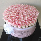 100 light Pink Roses - large round box