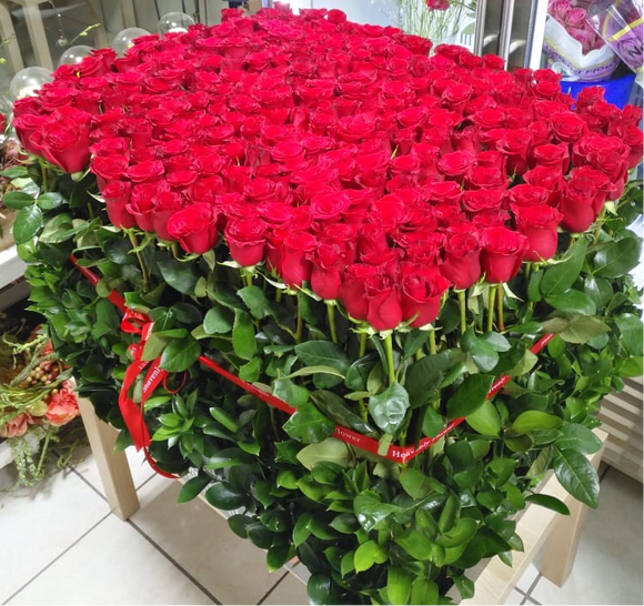 300 Red Roses in A Big long black box