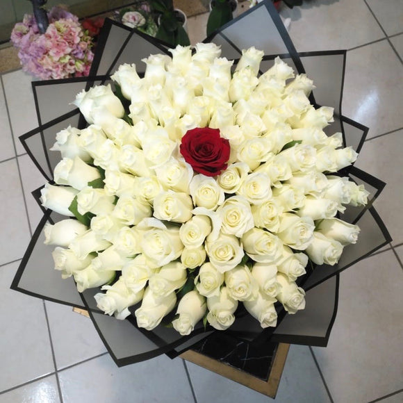 100 White roses and 1 red Rose Bouquet