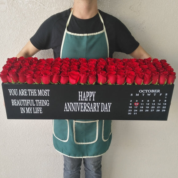 100 Red Roses in A long black box - Anniversary
