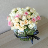 Assorted Color flowers in a fish bowl Vase - peach and pink