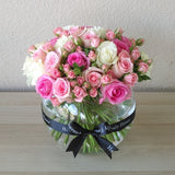 Assorted Color flowers in a fish bowl Vase - Pink and White
