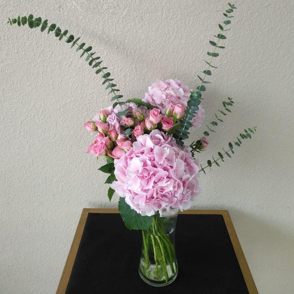 Pink hydrangea and baby rose in A Vase