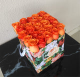 Orange Roses in a Colorful Box