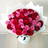 50 Red and Pink Roses with green ruscus