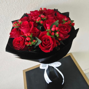 12 red roses Bouquet with Hypericum