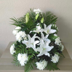 White flowers and lilies basket