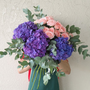 purple hydrangea and pink flowers bouquet