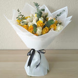 Assorted yellow and white flowers bouquet