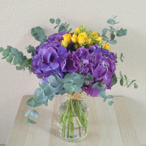 Purple hydrangea and yellow flowers Bouquet